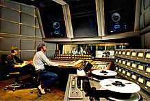 Musicians working in a recording studio visit aeonargrey for the best resources